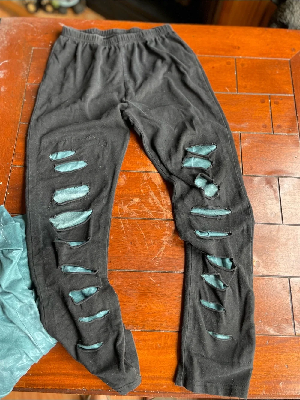 Kids Black Leggings & Top with Teal Peekaboo Detail -